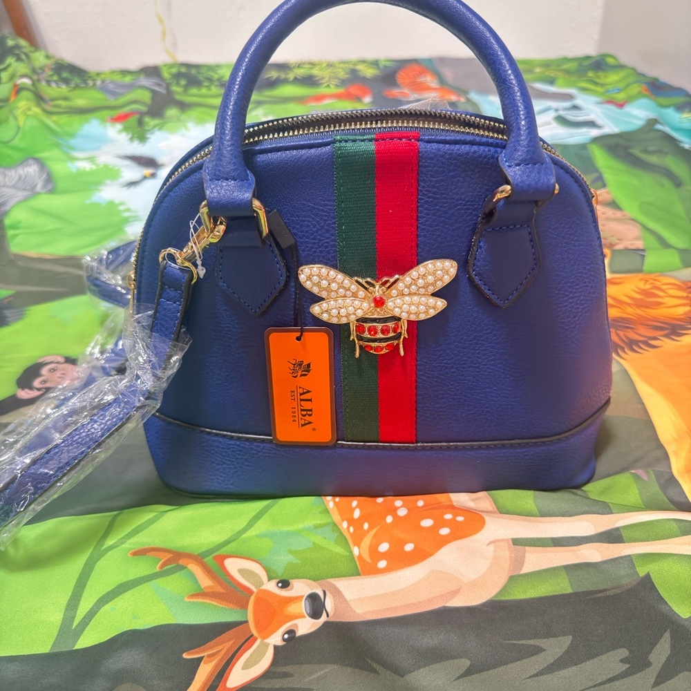 Blue Designer Handbag with Gold Accent